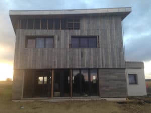 construction d'une maison bois avec jardin