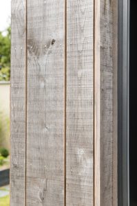 bardage bois gris d'une maison bois