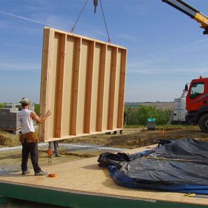 transporter un mur en bois d'une maison bois