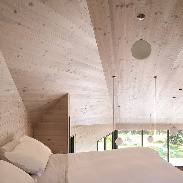 chambre des parents en bois dans maison bois à Québec