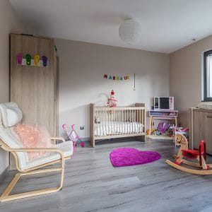chambre des enfants avec parquet dans maison bois à Algrange