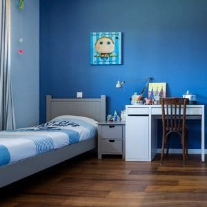 chambre à coucher avec parquet dans maison bois en Auvergne-Rhône-Alpes