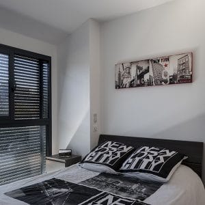 chambre des parents dans maison bois au Haute-Savoie