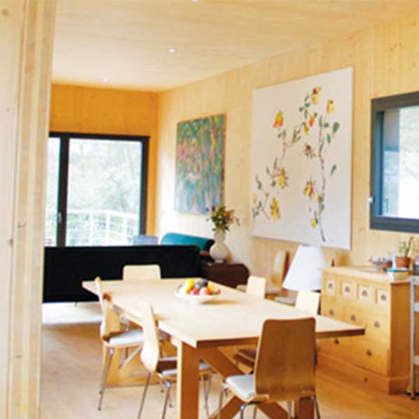 Intérieur d'une maison en CLT Novatop Nowawood Systèmes