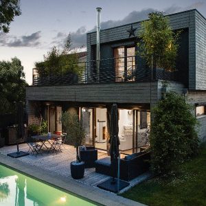 Une maison à ossature bois style cabane façade