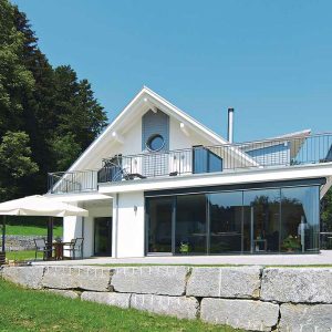 maison bois famille Schilling avec jardin